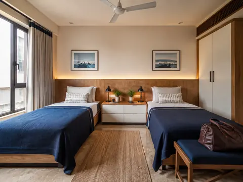 Twin guest bedroom: Parallel single beds, Oak veneer and Blue cotton