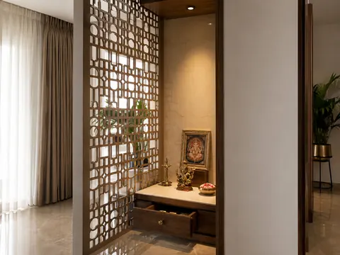 Jaali-screen pooja corner: Corner with light screen, Teak-look timber and Laser-cut metal jaali